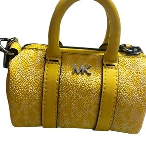 - NWT - Michael Kors mini duffle keychain or Fob.  Daffodil color.